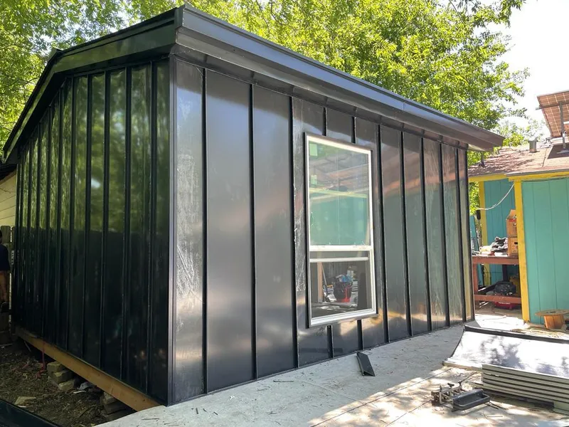 Black standing seam metal wall panels for Roof Inspection in Rock Springs