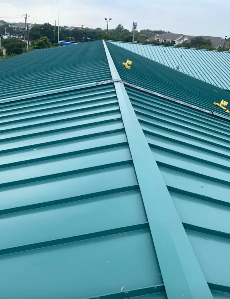 Green commercial metal roof ridge and valley for Metal Roof Repair in Rock Springs